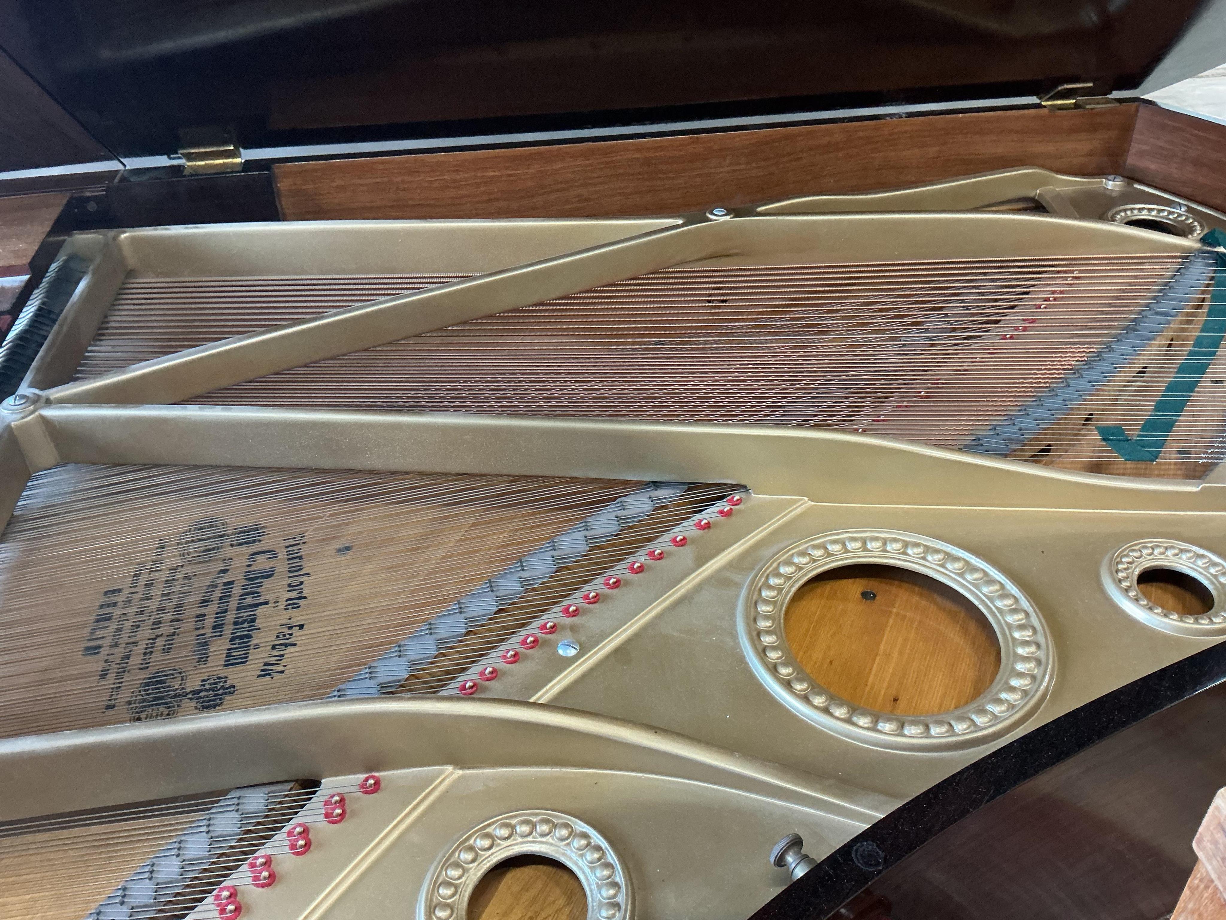 An early 20th century Bechstein 6ft. 8in. rosewood grand piano retailed by Harrods and duet piano stool, Provenance: Owned by Sally Matthews (internationally renowned Opera singer)